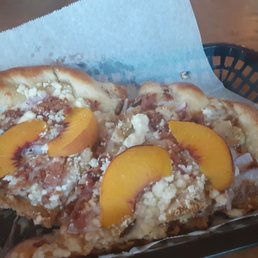 September's special pizza-chipotle bbq sauce, chicken, feta, onions, bacon and fresh sliced peaches, YUMMY! September's special pizza-chipotle bbq sauce, chicken, feta, onions, bacon and fresh sliced peaches, YUMMY!