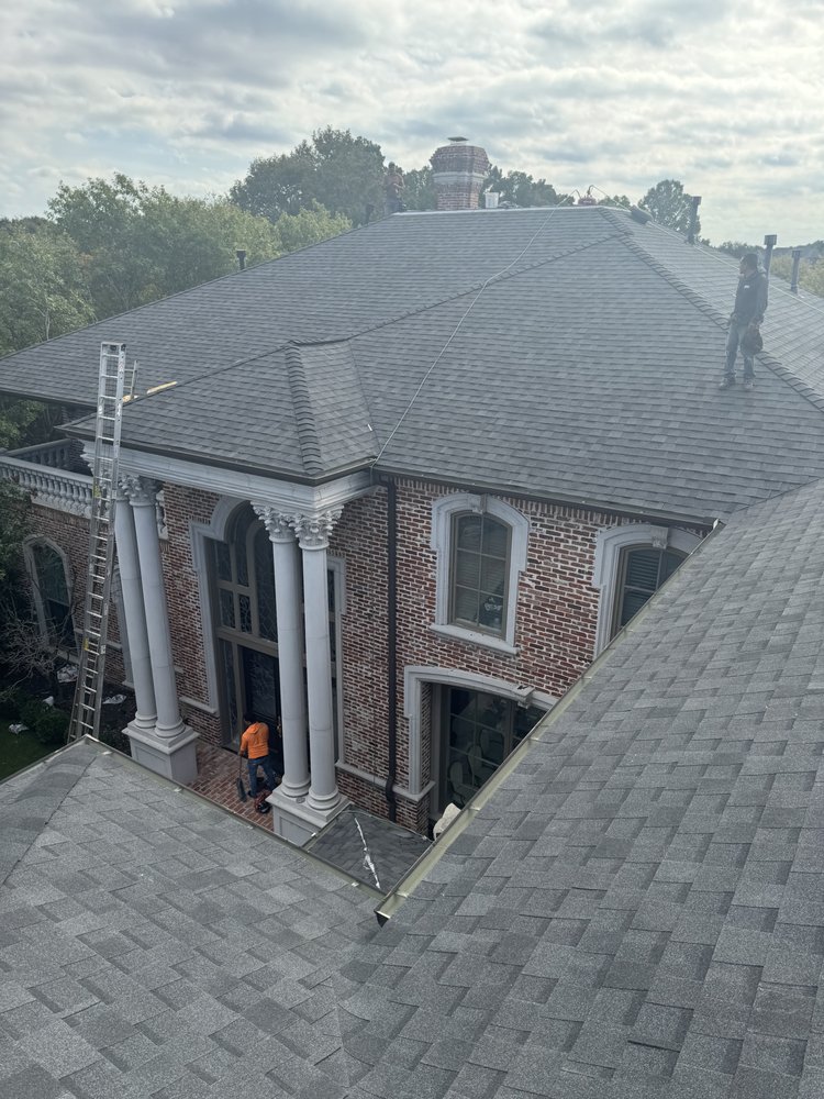 Slide of New Point Roofing