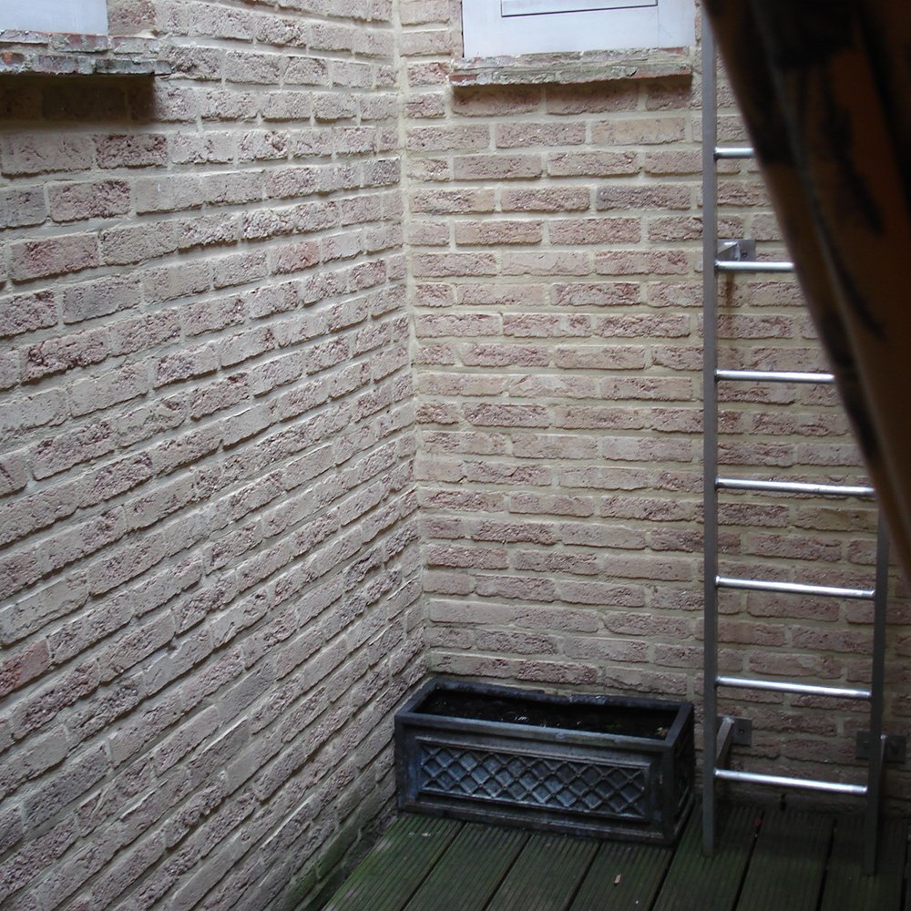 Relais Bourgondisch Cruyce - The patio outside our room. Not the most picturesque but it does the trick of giving some natural light to the room. - Hotels Near Me - Bruges, VWV