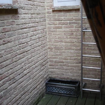 Relais Bourgondisch Cruyce - The patio outside our room. Not the most picturesque but it does the trick of giving some natural light to the room. - Hotels Near Me - Bruges, VWV