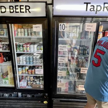 TapRm Cold Beer Store - a man standing in front of a cooler - Beer, Wine & Spirits Near Me - Brooklyn, New York