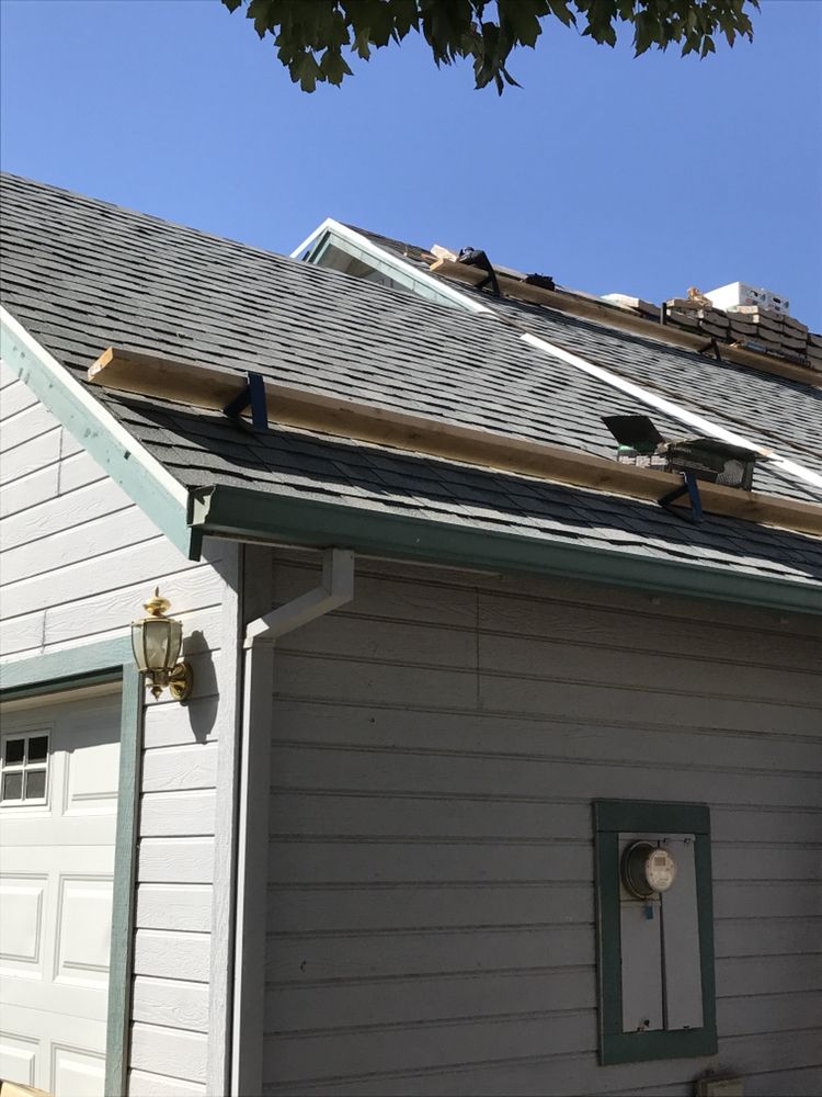 Slide of T&K Roofing