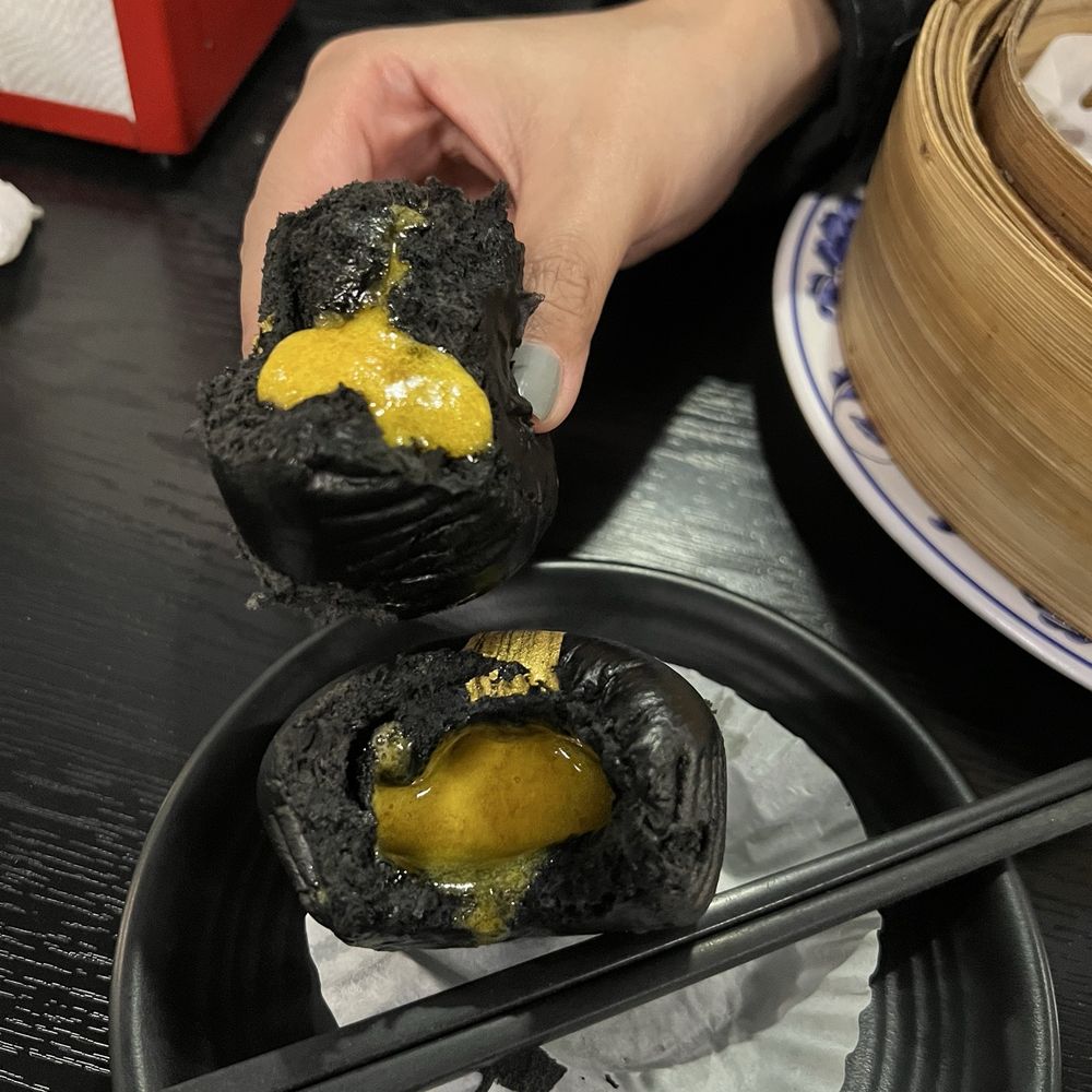 Dumpling Zone - Bite into the Black Lava Custard Bao - Dim Sum Near Me - San Francisco, California Dumpling Zone - Bite into the Black Lava Custard Bao - Dim Sum Near Me - San Francisco, California