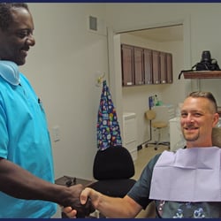 My Detroit Dentist - Dr. Harden and a patient.
