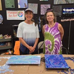 Sisters celebrating a birthday with a fun art project