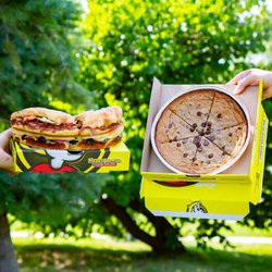 Hungry Howie's Pizza - Our menu features both calzone-style oven-baked subs and our Howie Cookie, a fresh-baked, shareable chocolate chip cookie.