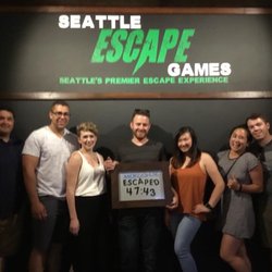 Seattle Escape Games - Hooray! We escaped from the morgue in 47 minutes and 43 seconds. With your permission, they take your photo and put it on FB at the end.