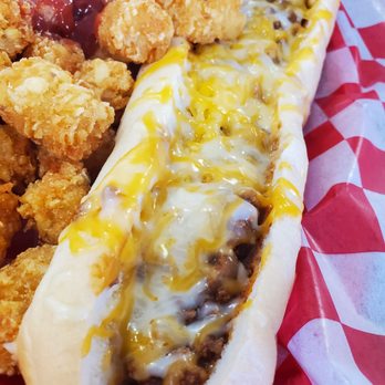 Moonlight Drive-In - Sometimes it's the simple things like this beautiful foot long hot dog! - Burgers Near Me - Titusville, Florida Moonlight Drive-In - Sometimes it's the simple things like this beautiful foot long hot dog! - Burgers Near Me - Titusville, Florida