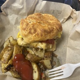 Sausage Egg and Cheese Biscuit w/ breakfast potatoes Sausage Egg and Cheese Biscuit w/ breakfast potatoes