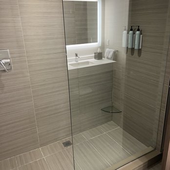 Courtyard by Marriott Akron Downtown - Shower with half glass wall - Hotels Near Me - Akron, Ohio Courtyard by Marriott Akron Downtown - Shower with half glass wall - Hotels Near Me - Akron, Ohio