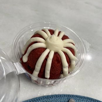 Nothing Bundt Cakes - Bundt cake icing that looks more like a spider than the normal Nothing Bundt Cake icing. - Bakeries Near Me - Lake Mary, Florida