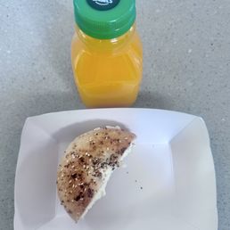 Bagel with Cream Cheese Everything Bagel with cream cheese and excellent fresh orange juice Bagel with Cream Cheese Everything Bagel with cream cheese and excellent fresh orange juice