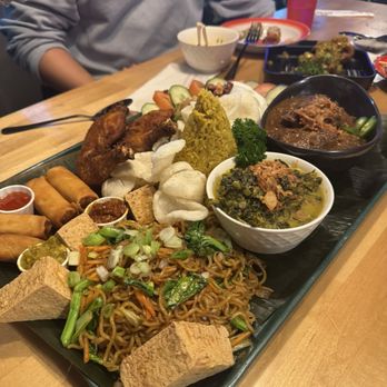 Rasa Rasa Kitchen - Big ol family tray, turned us into savages - Asian Fusion Near Me - San Francisco, California
