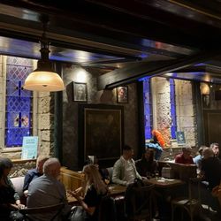 Oran Mor - Glow from the stained glass and paneled walls