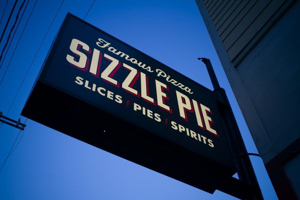 Photo of Sizzle Pie - Seattle, WA, US. Sizzle Pie in the autumn sky.