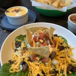 Beef fajita salad and queso. Very delicious!