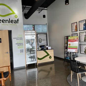 Greenleaf - a table and chairs in a clean office - Juice Bars & Smoothies Near Me - Indianapolis, Indiana