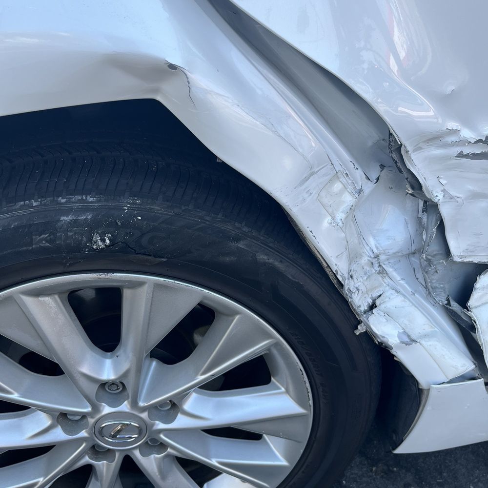 A Checkered Towing - My punctured tire. Making vehicle unable to drive. - Towing Near Me - Long Beach, California