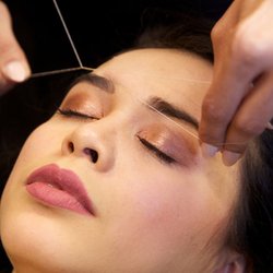 Eyebrows - Natural way of shaping eyebrows with a thread.