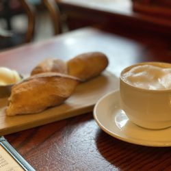 Le Bouchon - Upon arrival, hot baguette is paired with my cappuccino.  Delicious way to open the conversation.