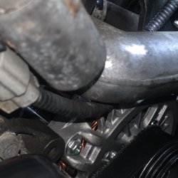 Superior Care Auto Center - Belt rubbing onto alternator and being damaged due to friction from bad installation as u can see.
