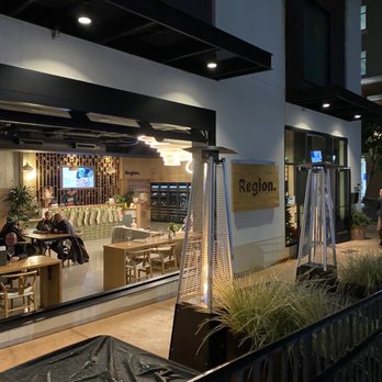 Region - people sitting at tables outside a restaurant - Wine Bars Near Me - San Luis Obispo, California Region - people sitting at tables outside a restaurant - Wine Bars Near Me - San Luis Obispo, California