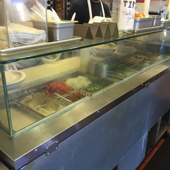Falafel Stop - Grill counter (tahini sauce followed by hummus on the far left) - Falafel Near Me - Sunnyvale, California