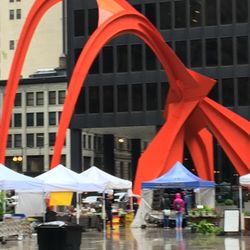 Federal Plaza Farmers Market - "The Flamingo" Sculpture was created by Alexander Calder and presented to the City of Chicago in 1974