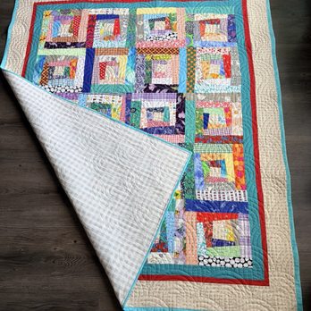 Tea Time Quilting - All these fabrics for this scrappy wonky logcabin lap quilt came from Tea Time Quilts! - Fabric Stores Near Me - Houston, Texas Tea Time Quilting - All these fabrics for this scrappy wonky logcabin lap quilt came from Tea Time Quilts! - Fabric Stores Near Me - Houston, Texas