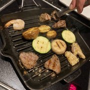 Photo of The Melting Pot - Westwood, NJ, United States. Cast Iron Grill cooking option