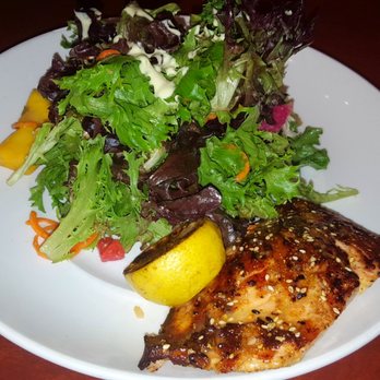 Seasons 52 - Sesame Grilled Salmon with organic greens, mango, jicama, lemongrass sauce, and toasted sesame dressing. $17.40 - New American Near Me - Jacksonville, Florida Seasons 52 - Sesame Grilled Salmon with organic greens, mango, jicama, lemongrass sauce, and toasted sesame dressing. $17.40 - New American Near Me - Jacksonville, Florida