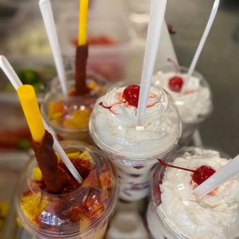 La Michoacana - Mangonadas (on the left) and Fresas con Crema (on the right) - Desserts Near Me - Wyoming, Michigan La Michoacana - Mangonadas (on the left) and Fresas con Crema (on the right) - Desserts Near Me - Wyoming, Michigan