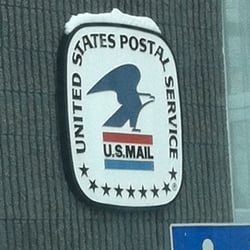 US Post Office - Here is the badge on the front of the building.