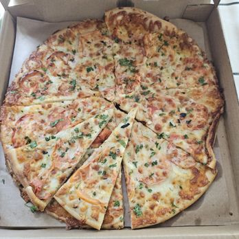 Cheese Board Pizza - Romano tomatoes, fennel, mozzarella, aged Asiago cheese, garlic, olive oil, fried garlic chips, oregano, and parsley. - Pizza Near Me - Berkeley, California