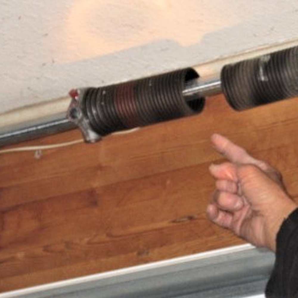 Automatic Garage Door Services - The broken spring. - Garage Door Services Near Me - Lancaster, California