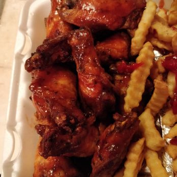 Photo of NJ Weedman's Joint - Trenton, NJ, United States. Dozen Wings with Weedman's Sauce