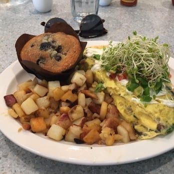 Wild Eggs - Surfer girl with the blueberry/lemon swirl muffin! - Breakfast & Brunch Near Me - Indianapolis, Indiana