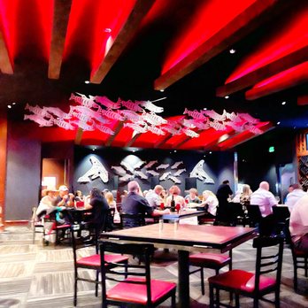 Blackfish - people eating in a restaurant with red lighting - Seafood Near Me - Tulalip, Washington