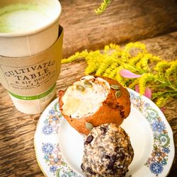 Cultivated Table & Sip House - Matcha honey flavored, pumpkin spice n cheesecake muffin, and protein chocolate seeded bites.