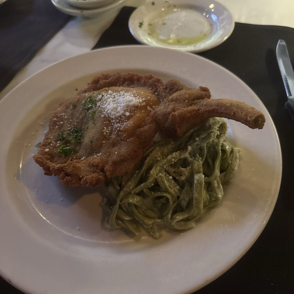 Cafe Tiramisu - Stuffed Pork Chop - Italian Near Me - Raleigh, North Carolina Cafe Tiramisu - Stuffed Pork Chop - Italian Near Me - Raleigh, North Carolina