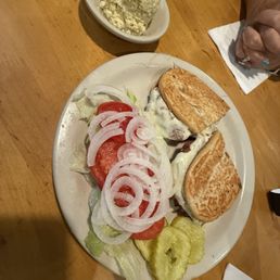 Cuban sandwich with a side of potato salad Cuban sandwich with a side of potato salad