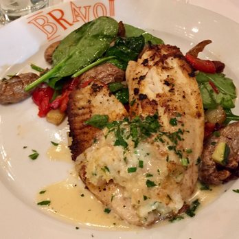 Bravo! Italian Kitchen - Grilled Tilapia topped w/Crab & Shrimp; fingerling potatoes - Italian Near Me - Lansing, Michigan