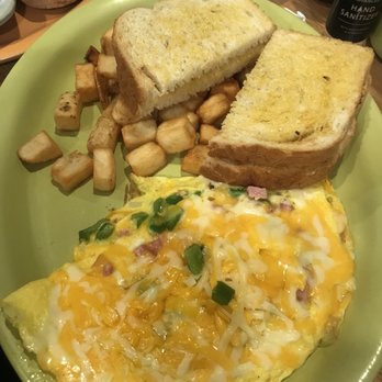 Scramblers - Wild west omelette. Green pepper, onions, ham, monterey & chedder cheese. Served with potatoes & choice of bread . - Breakfast & Brunch Near Me - Sharonville, Ohio Scramblers - Wild west omelette. Green pepper, onions, ham, monterey & chedder cheese. Served with potatoes & choice of bread . - Breakfast & Brunch Near Me - Sharonville, Ohio