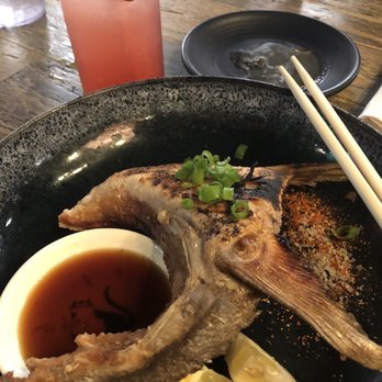 Susuru - The Hamachi Kama with an Ultraman cocktail - Izakaya Near Me - Orlando, Florida Susuru - The Hamachi Kama with an Ultraman cocktail - Izakaya Near Me - Orlando, Florida