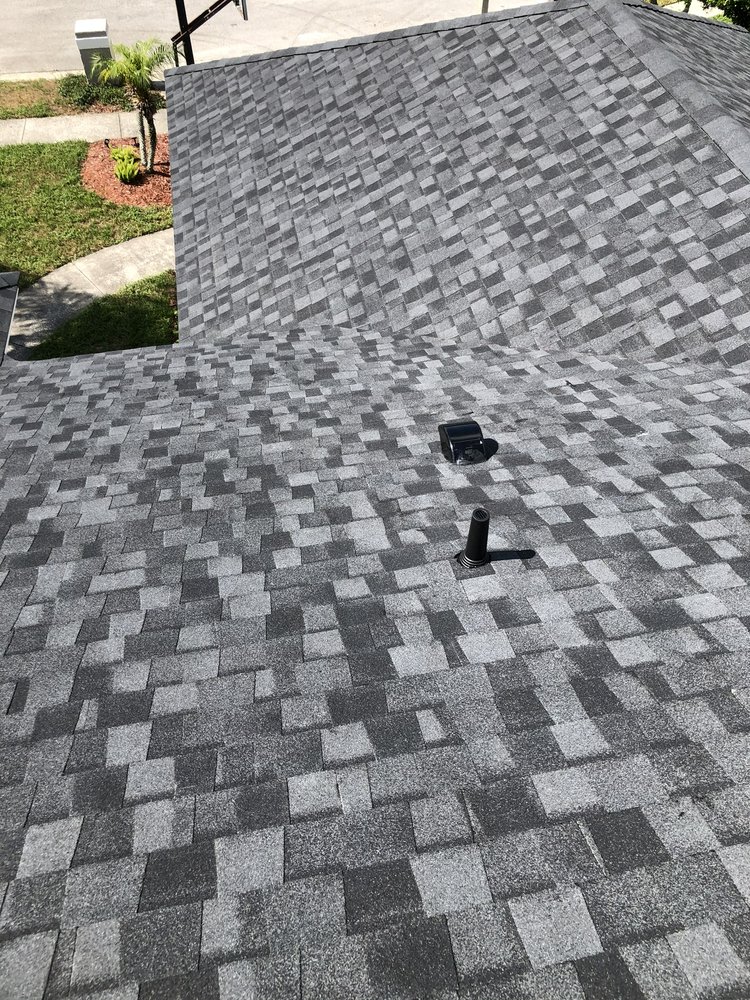 Slide of Roof Pros USA