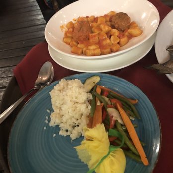 Cafe Gabbiano - Gnocchi with vodka sauce and an order of meatballs, along with the sides for the bronzino - Italian Near Me - Sarasota, Florida Cafe Gabbiano - Gnocchi with vodka sauce and an order of meatballs, along with the sides for the bronzino - Italian Near Me - Sarasota, Florida