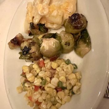 Ruth's Chris Steak House - Corn, Brussel sprouts, au gratin potatoes - Steakhouses Near Me - Destin, Florida Ruth's Chris Steak House - Corn, Brussel sprouts, au gratin potatoes - Steakhouses Near Me - Destin, Florida