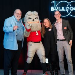 Posing with Harry Dog and receiving the 2024 Bulldog 100 award