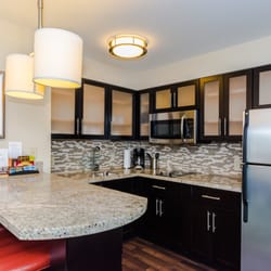 Staybridge Suites Grand Forks - Fully equipped kitchens in every room