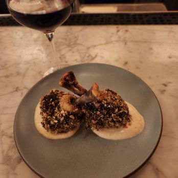 Canon - chicken drumsticks (with my Austrian wine in the background) - Cocktail Bars Near Me - Sacramento, California